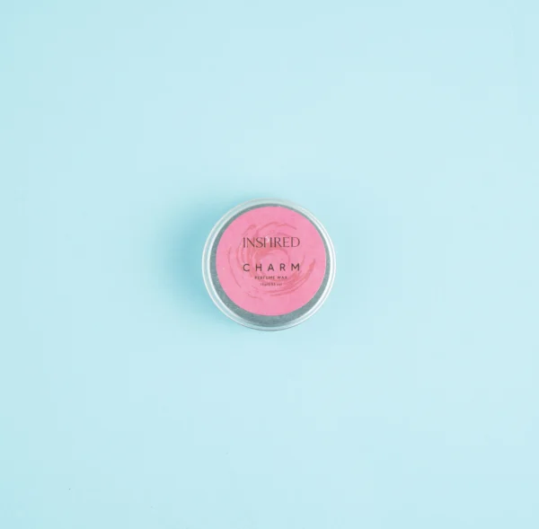 Solid Perfume Charm displayed elegantly, inspired by Gucci Flora with fresh floral notes.