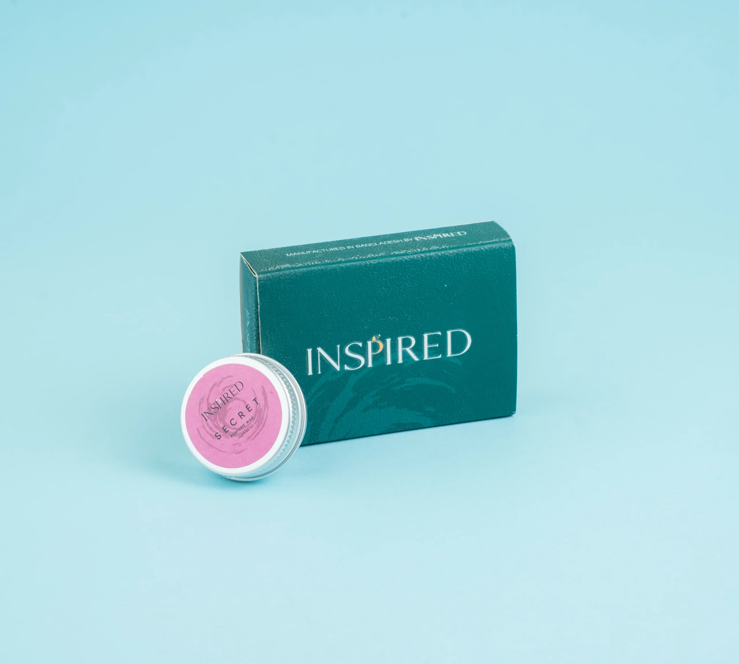 Solid Perfume Secret displayed elegantly, inspired by Bombshell with fresh fruity floral notes.